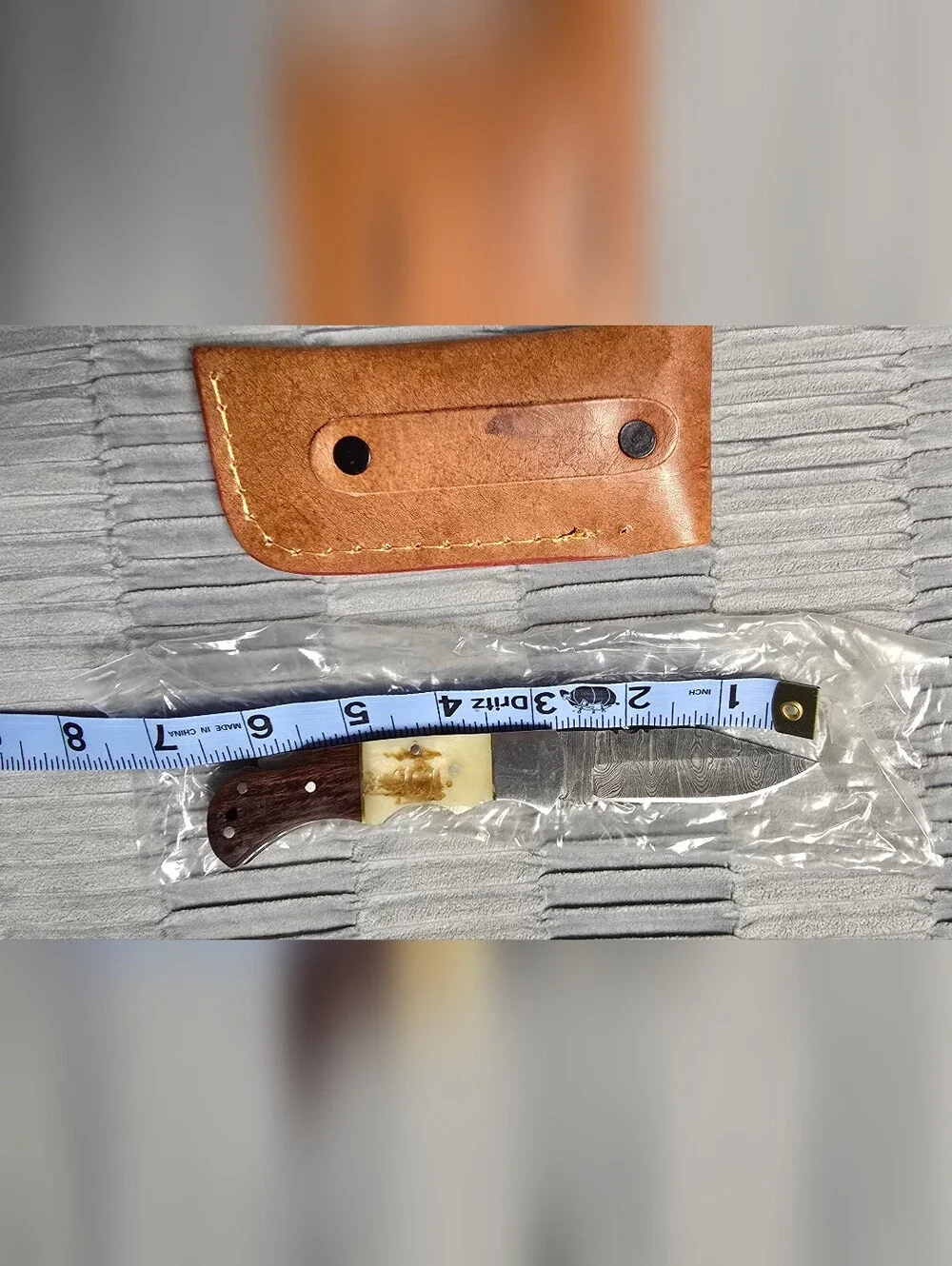 Custom Damascus Folding Knife with Tan Leather Sheath
